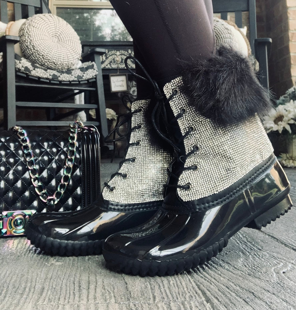 Black and 2025 white duck boots