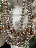 Iridescent Taupe and Leopard 60” Beads